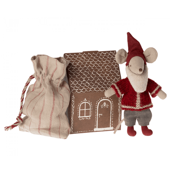 Santa Claus mouse in the gingerbread house 