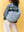 Herzen auf hellblauem Denim der Studio Noos Cross Body Bag