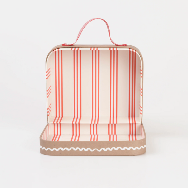 Mini reindeer doll in a suitcase