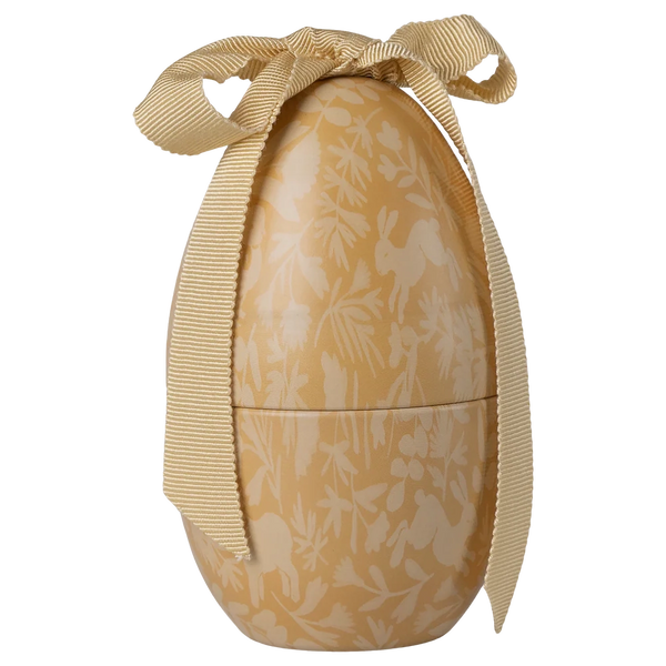 Small cream-yellow Easter egg for filling 