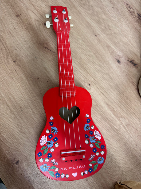 Exhibition: Ukulele made of wood Barbados Cherry