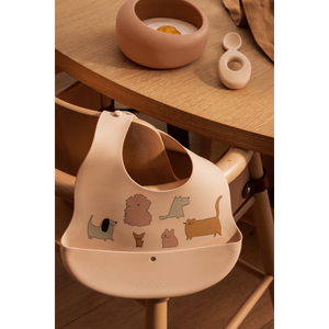 2-pack Ember silicone bib featuring cute animal prints, perfectly designed for mealtime messes.