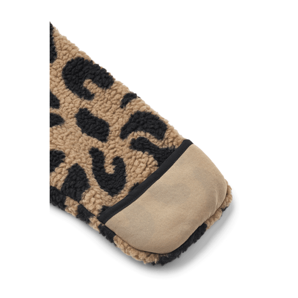 Cozy leopard print fabric of Nolano baby overall with durable suede-like trim.