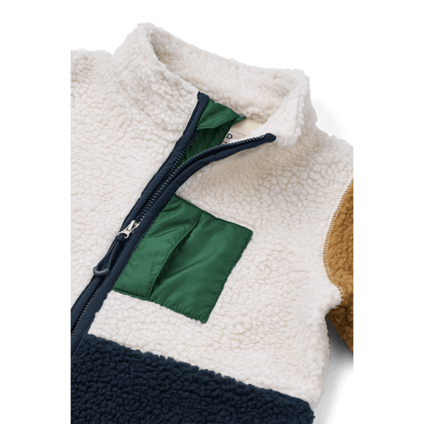Nolano Baby Overall in classic navy mix, featuring soft fleece and a stylish green chest pocket.