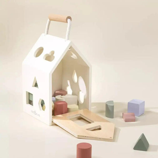 Sorting house for wooden shapes