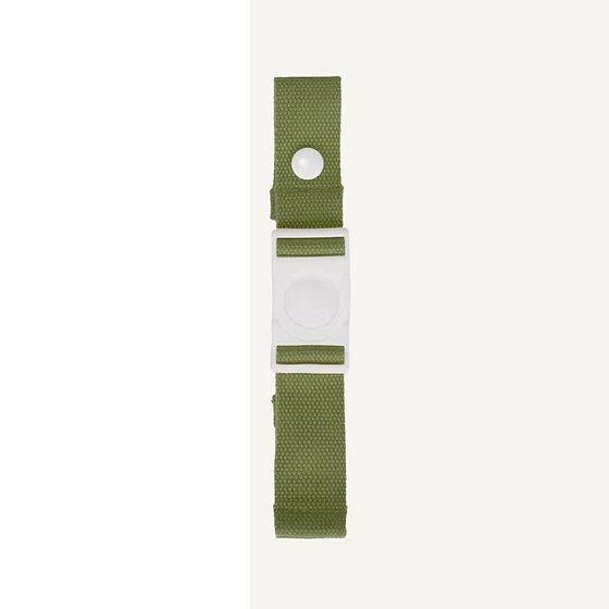 Chest strap tickling grass