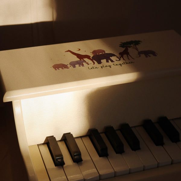 Safari à queue avec piano en bois