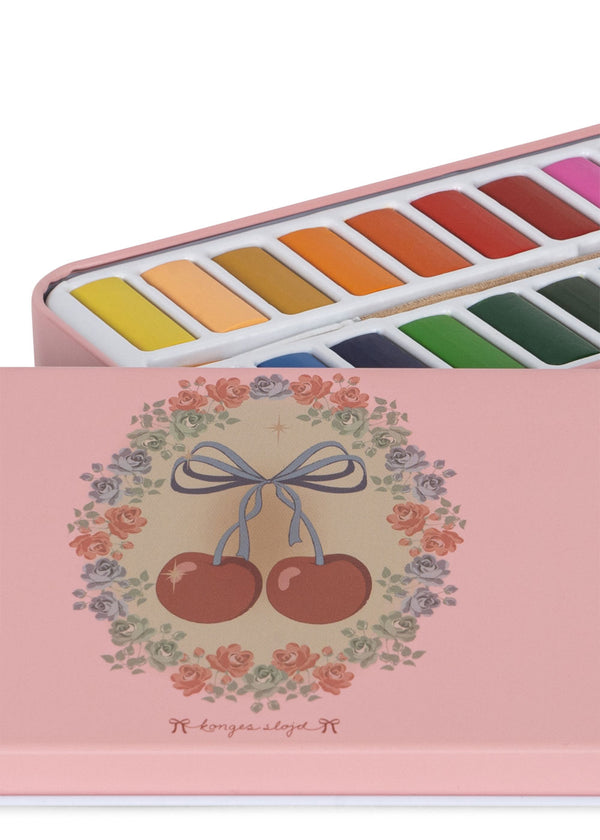 Watercolor paint in a tin Cherry Bow