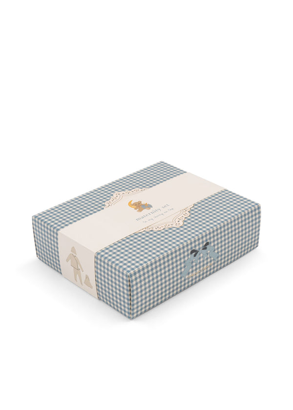 Classic Geburtspaket Creme Brulee in einer eleganten Geschenkbox mit kariertem Design.