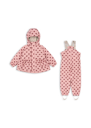 Palme Rüschen-Regenset Amour Pink: wasserdichtes Kinderregenoutfit mit Herzmotiven und Fleecefutter.