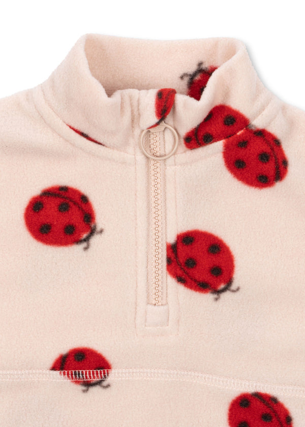 Tavi Fleece-Sweatshirt in soft fleece with ladybug print and high collar, perfect for warmth and versatility.