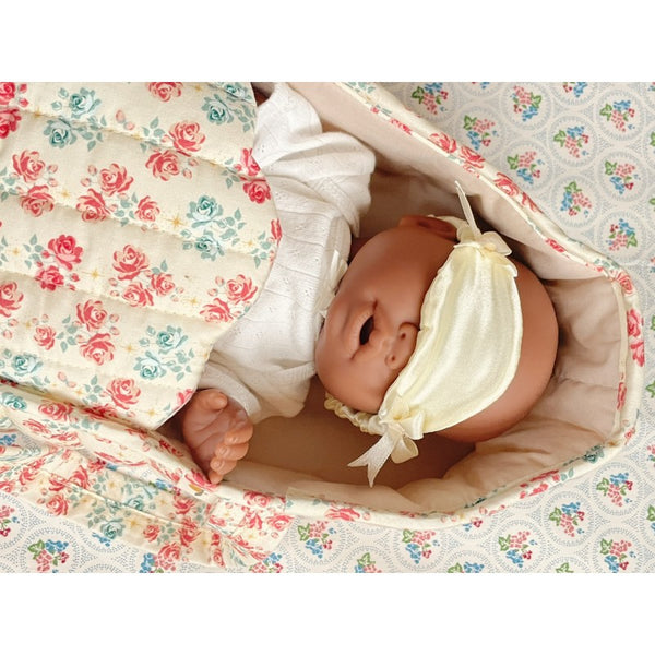 Lea in doll carrycot