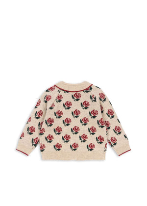 Kind trägt den Belou Strick-Cardigan Rose