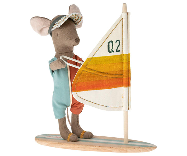 Beach mouse with surfboard little brother