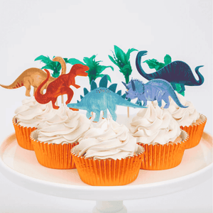 T-Rex und Krepppapier-Palme unter den Meri Meri Dino-Toppern